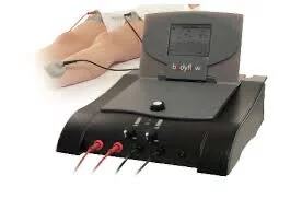 Electronic muscle stimulator device with electrode pads connected and attached to legs.